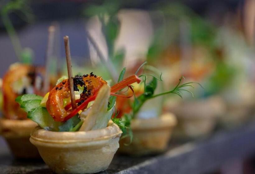 호텔 Earls Regency