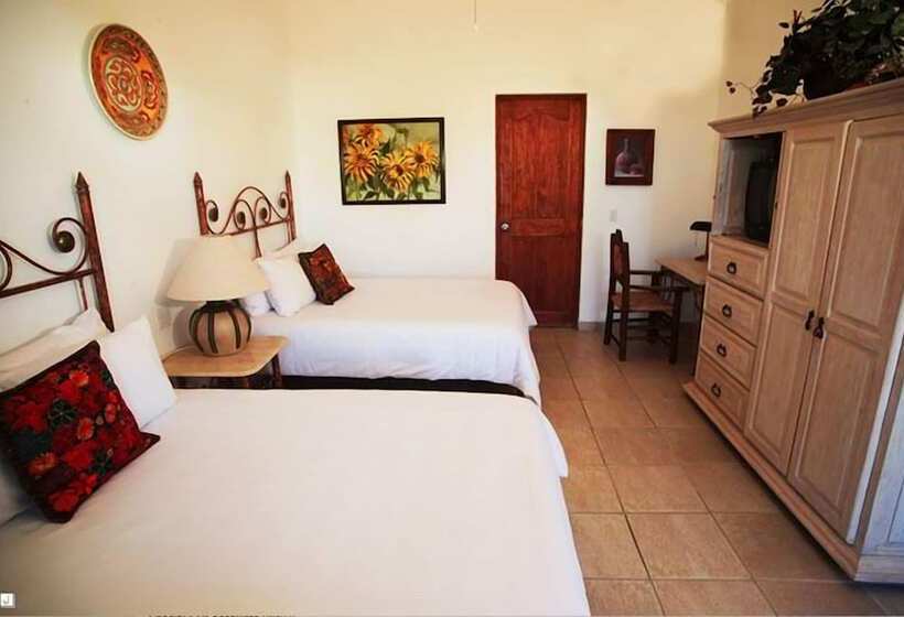 בית מלון כפרי El Encanto Inn & Suites