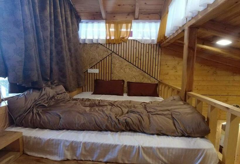 פנסיון Rooftop Cottages & Restaurant, Pangot