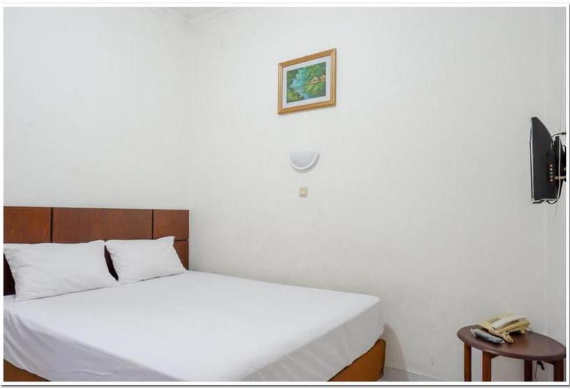 호텔 Puspa Indah Guesthouse Redpartner