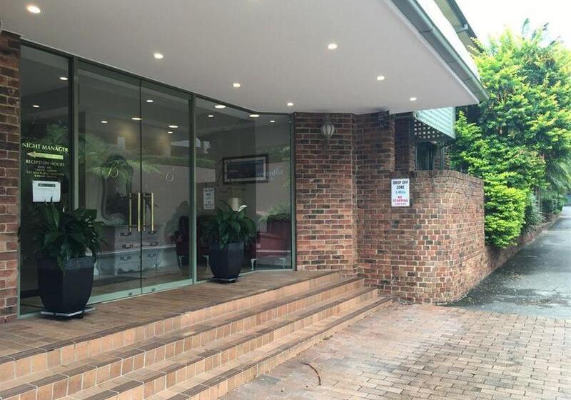 Отель The Belmore Apartments