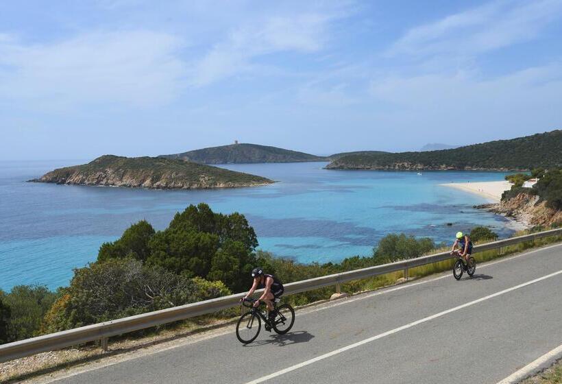 בית מלון כפרי Baia Di Chia Resort Sardinia, Curio Collection By Hilton