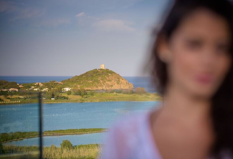 בית מלון כפרי Baia Di Chia Resort Sardinia, Curio Collection By Hilton