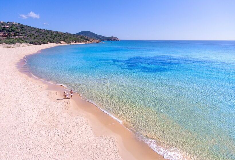 בית מלון כפרי Baia Di Chia Resort Sardinia, Curio Collection By Hilton