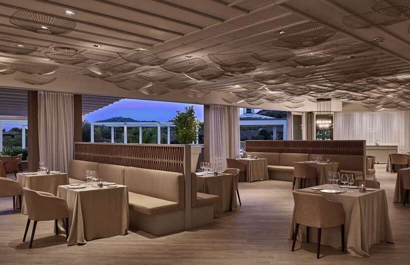 בית מלון כפרי Baia Di Chia Resort Sardinia, Curio Collection By Hilton