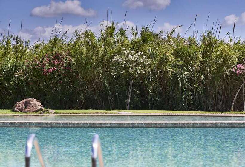 בית מלון כפרי Baia Di Chia Resort Sardinia, Curio Collection By Hilton