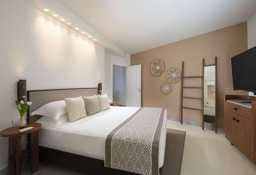 בית מלון כפרי Baia Di Chia Resort Sardinia, Curio Collection By Hilton