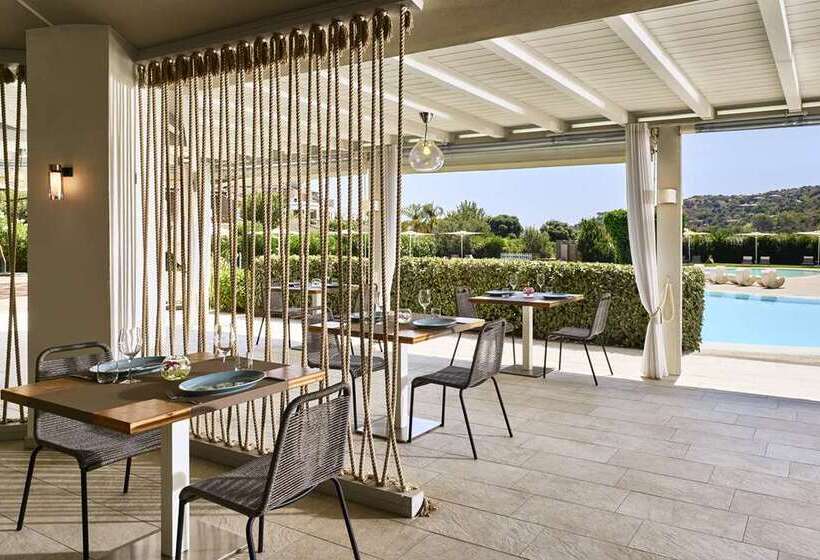Отель Baia Di Chia Resort Sardinia, Curio Collection By Hilton