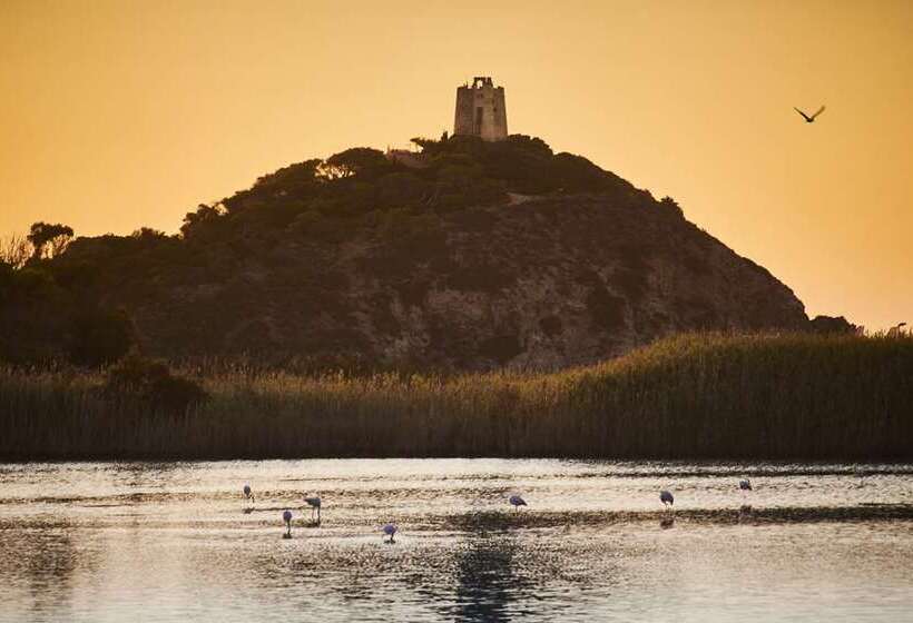 בית מלון כפרי Baia Di Chia Resort Sardinia, Curio Collection By Hilton