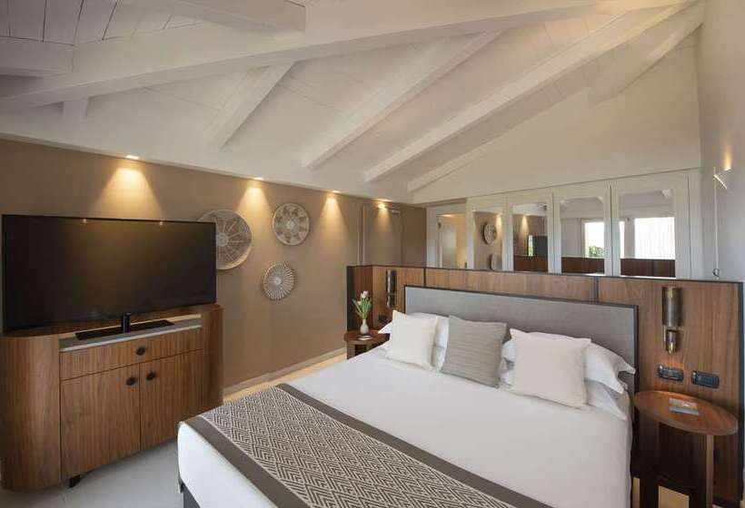 Отель Baia Di Chia Resort Sardinia, Curio Collection By Hilton
