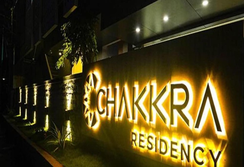Отель Fab Chakkra Residency