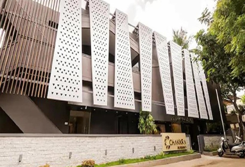 Отель Fab Chakkra Residency