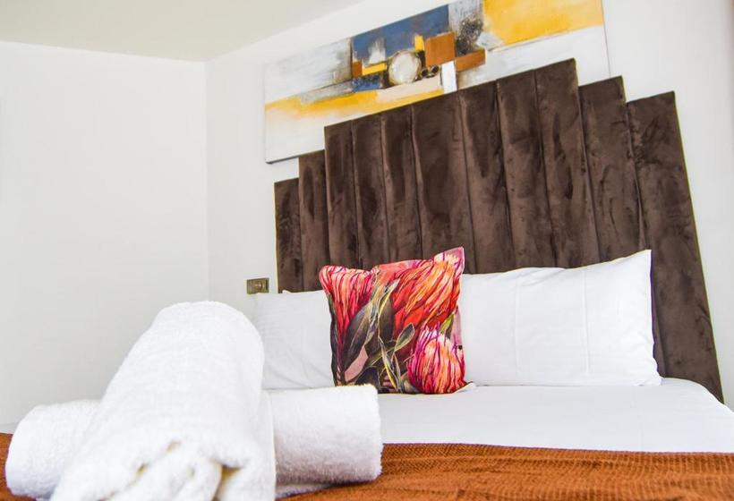 פנסיון 112 On Kloof Guesthouse