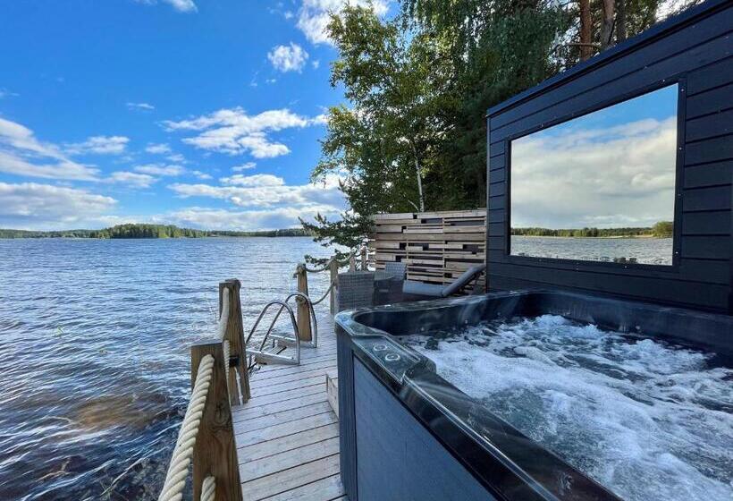 Lake Hotel Lehmonkärki   Haasi Mirror Houses