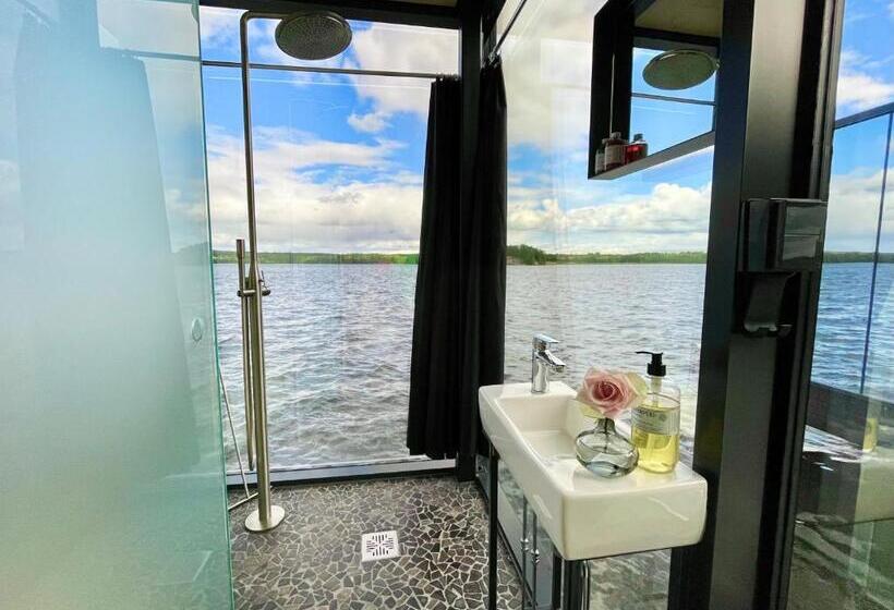 Lake Hotel Lehmonkärki   Haasi Mirror Houses