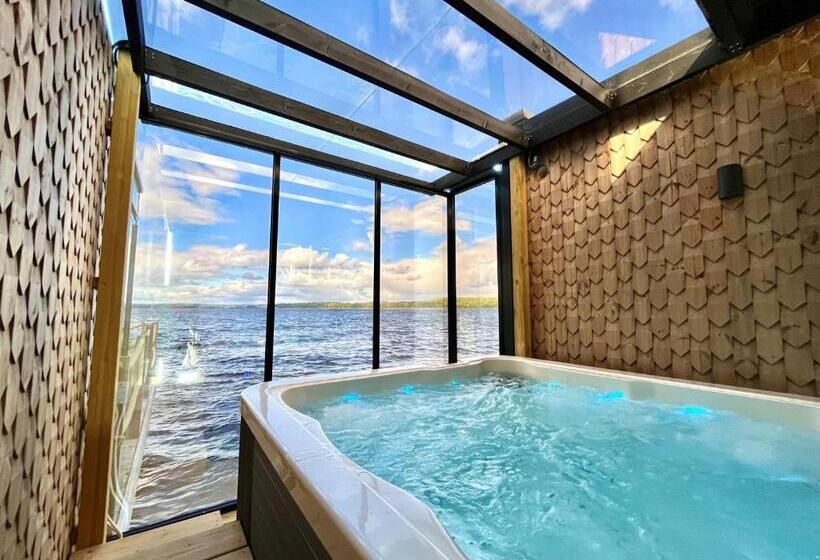 Lake Hotel Lehmonkärki   Haasi Mirror Houses