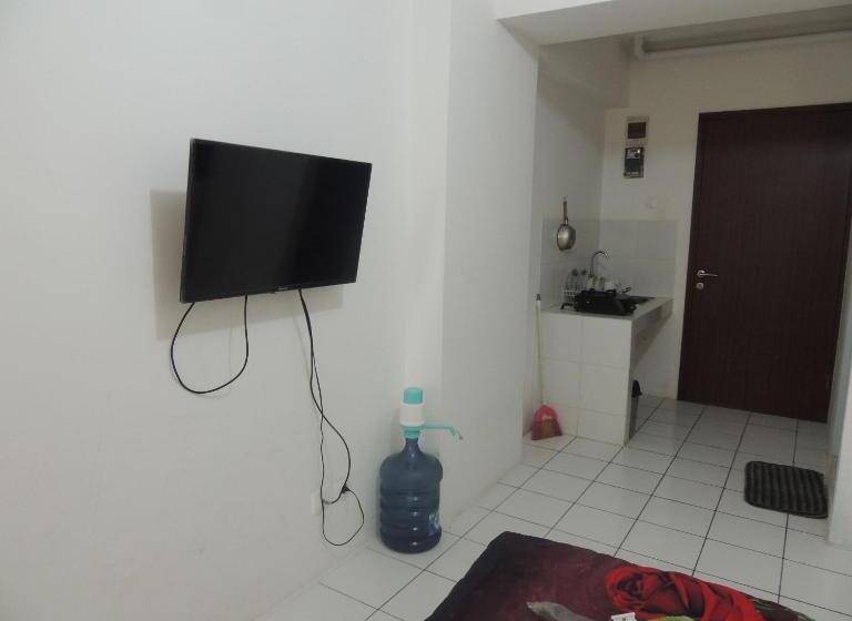 Отель Reva Room On Gunung Putri Square Apartment