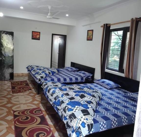 فندق صغير Ambika Cottages