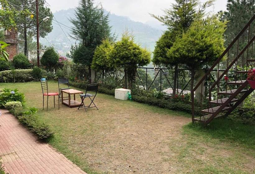 فندق صغير Ambika Cottages