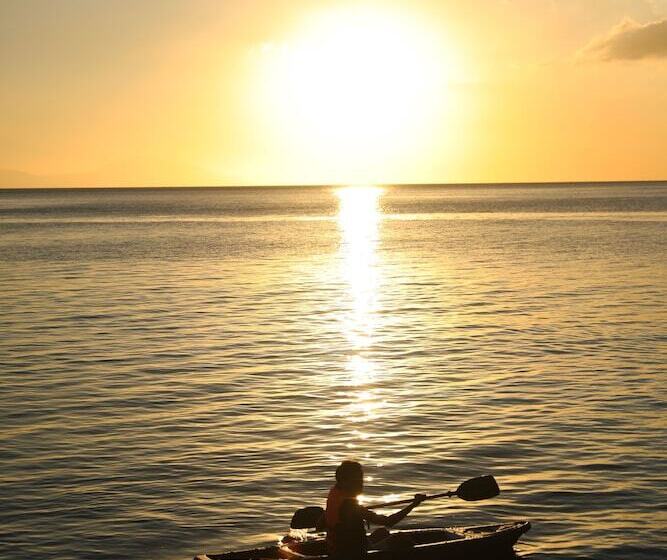 בית מלון כפרי Destino Beach Club Dive Resort And