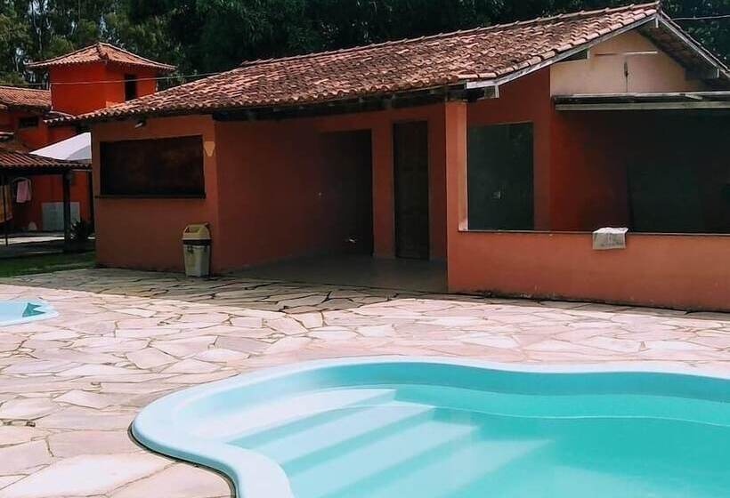 Отель Pousada E Camping Casa Laranja