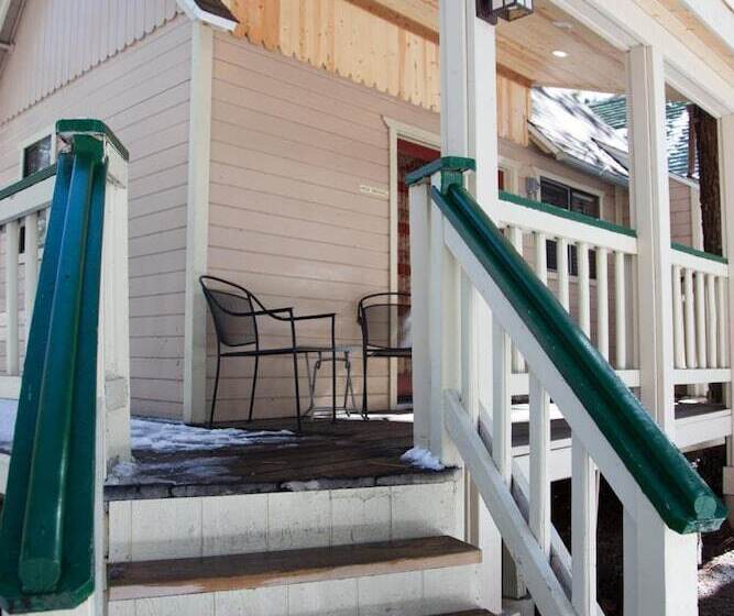 هتل Sleepy Forest Cottages