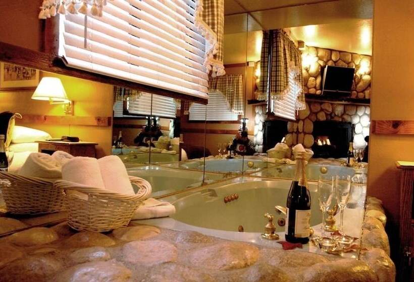 هتل Sleepy Forest Cottages