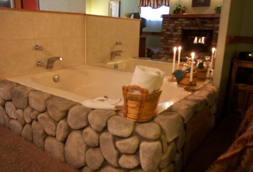 هتل Sleepy Forest Cottages