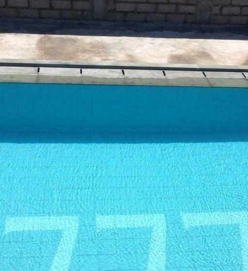 호텔 Kuta Paradise 777