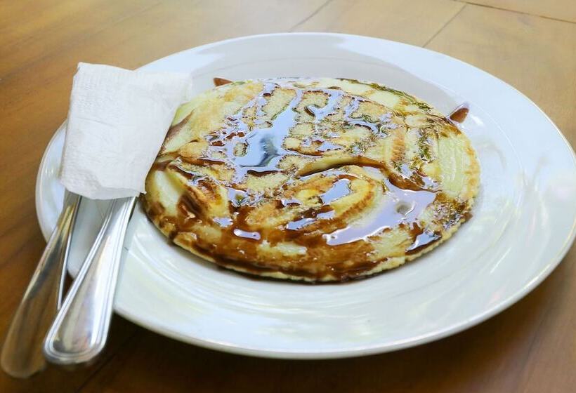 פנסיון Ratu Cottage