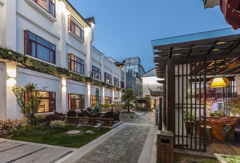 בית מלון כפרי Hejing Chengshang Generations