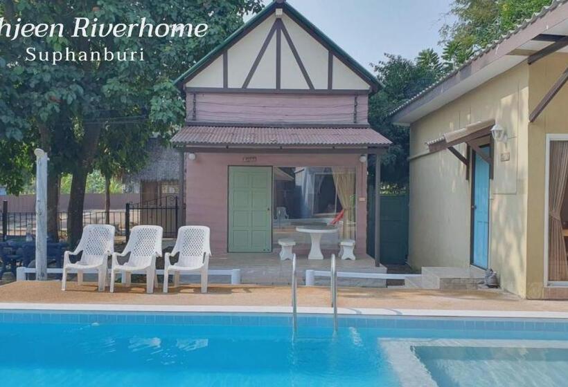 Отель Tahjeen Riverhome