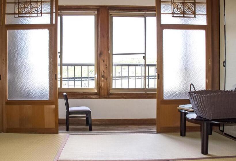 פנסיון Guest Cafe Kuchikumano