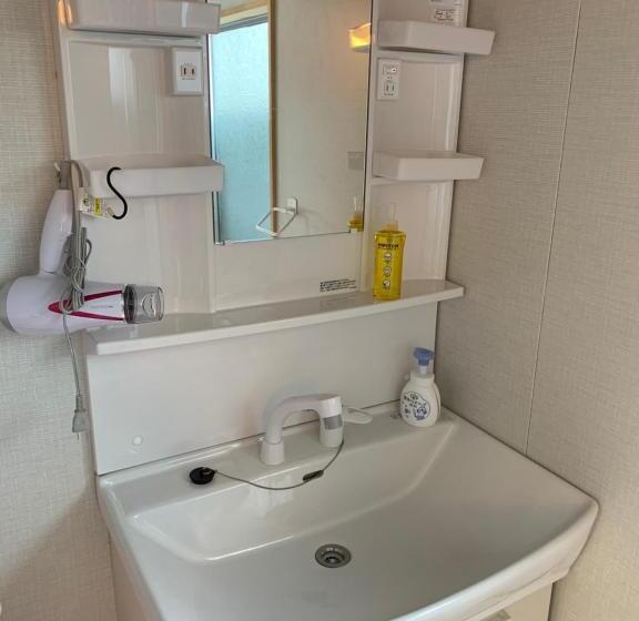 פנסיון Guest Cafe Kuchikumano