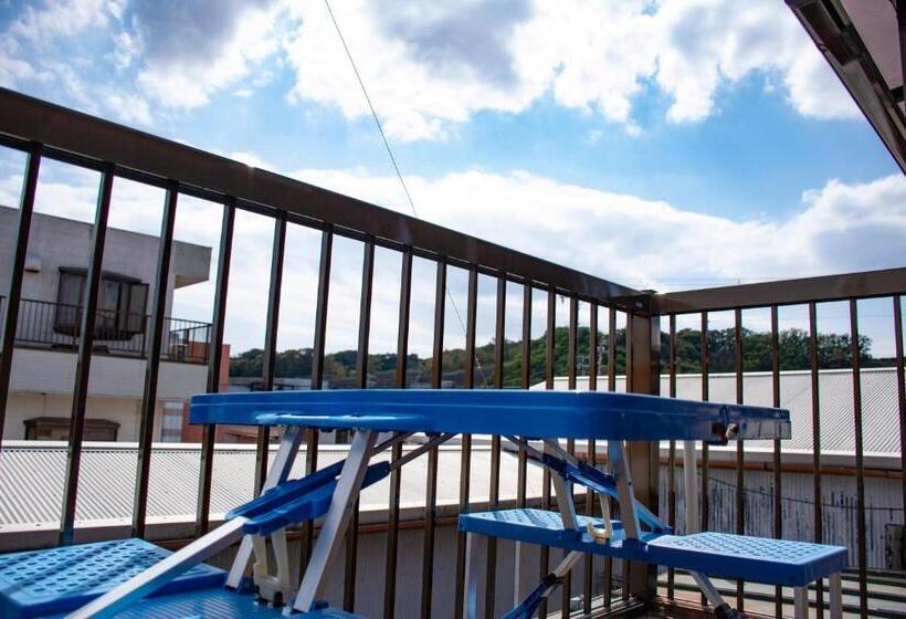 פנסיון Guest Cafe Kuchikumano