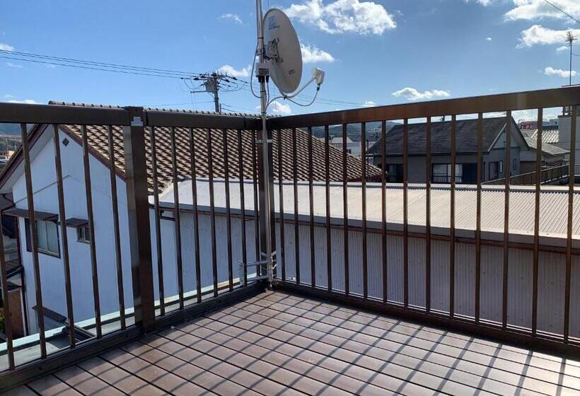 פנסיון Guest Cafe Kuchikumano