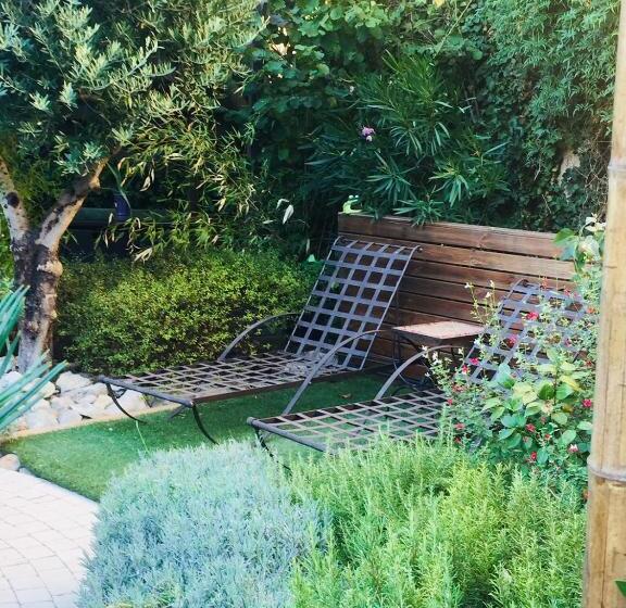 مبيت وإفطار O Palmier Caché