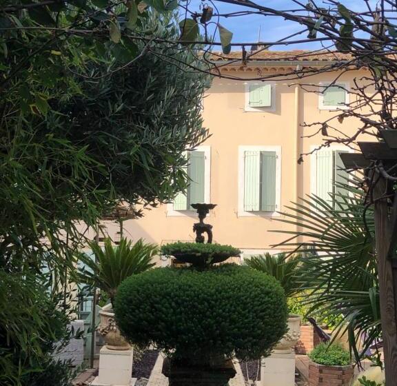 مبيت وإفطار O Palmier Caché