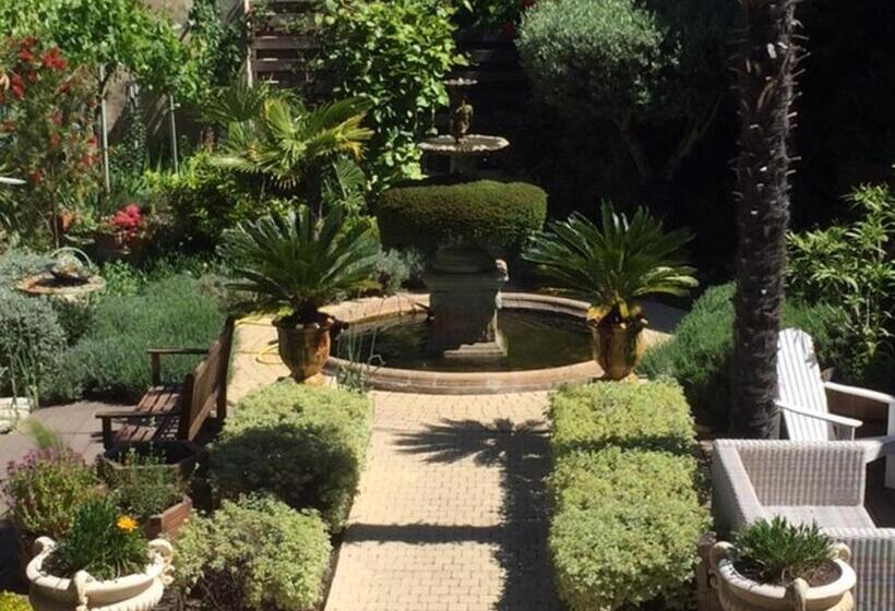 مبيت وإفطار O Palmier Caché