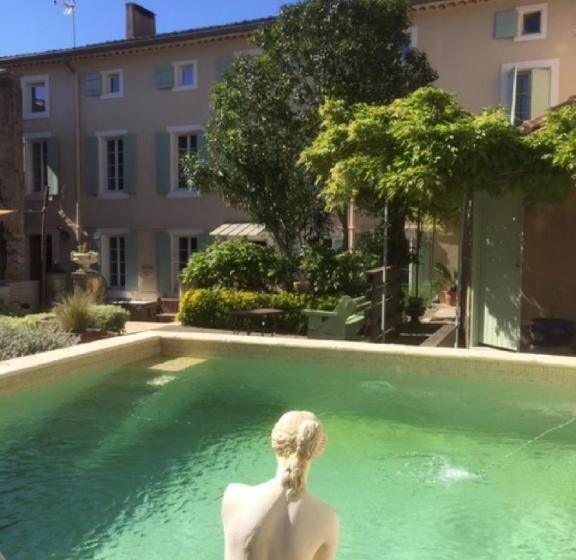 مبيت وإفطار O Palmier Caché