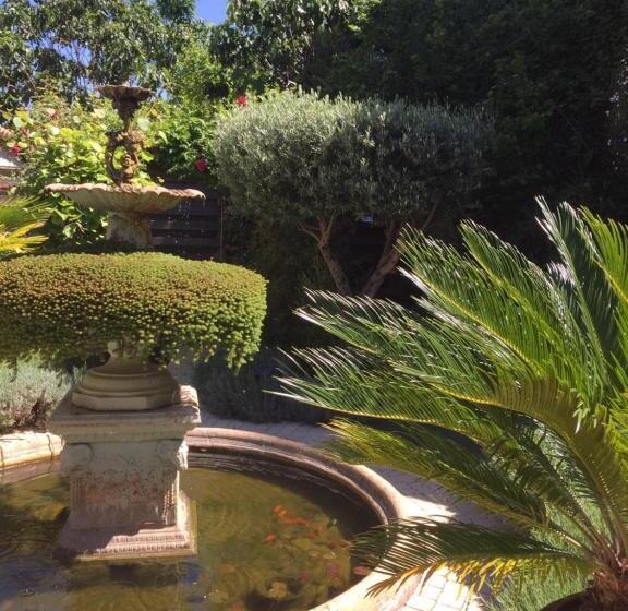 مبيت وإفطار O Palmier Caché