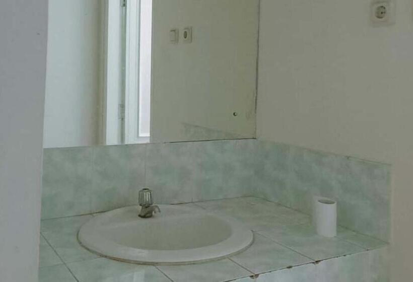 Отель Villa Lotus E06 Syariah Redpartner