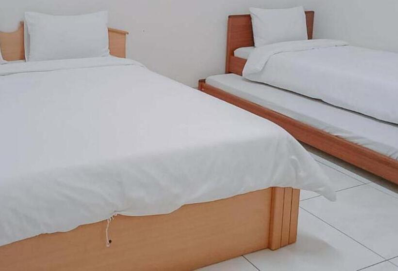 Отель Villa Lotus E06 Syariah Redpartner