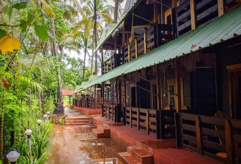 בית מלון כפרי Lotusfeet Beach Resort Morjim