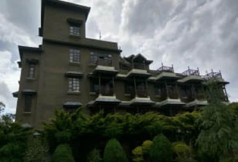 酒店 Blossoms Village Resort