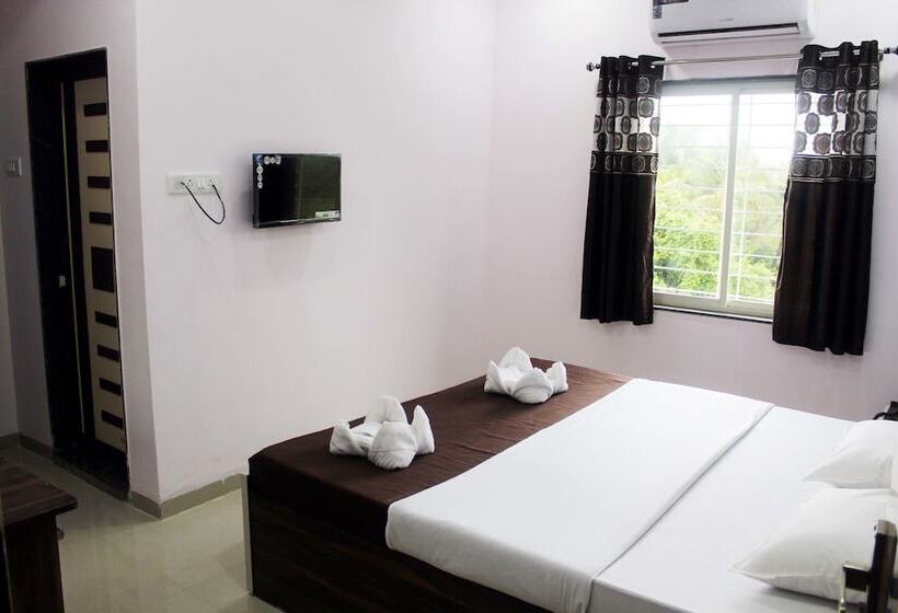 בית מלון כפרי Neelisha River Front Inn