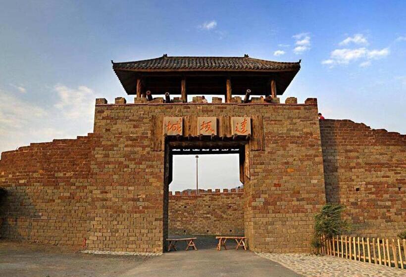 בית מלון כפרי 7days Inn Turpan Dashizi