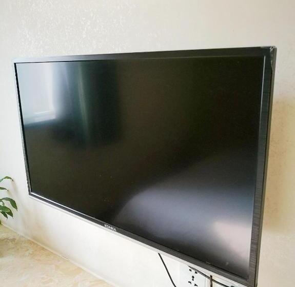 בית מלון כפרי 7days Inn Turpan Dashizi