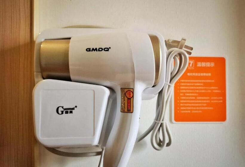 בית מלון כפרי 7days Inn Turpan Dashizi