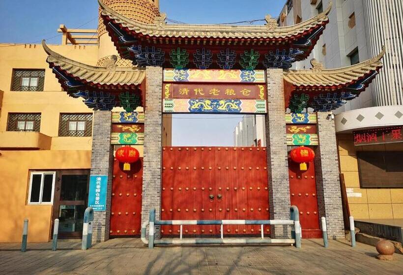 בית מלון כפרי 7days Inn Turpan Dashizi